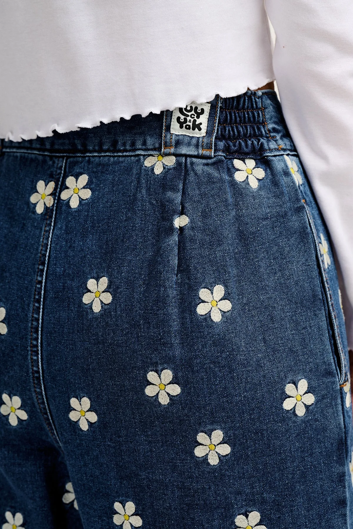 Lucy & Yak Addison - Tapered Denim Jeans in Mid Wash with Daisy Embroidery