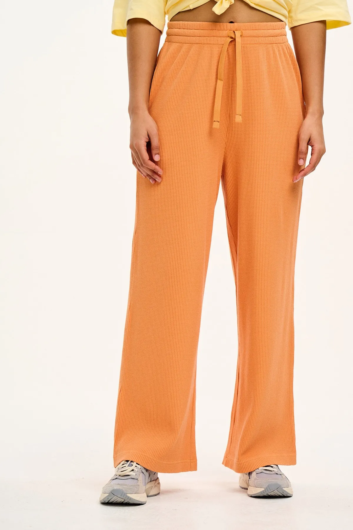 Lucy & Yak Larson - Wide Leg Waffle Cotton Joggers in Sunset Orange